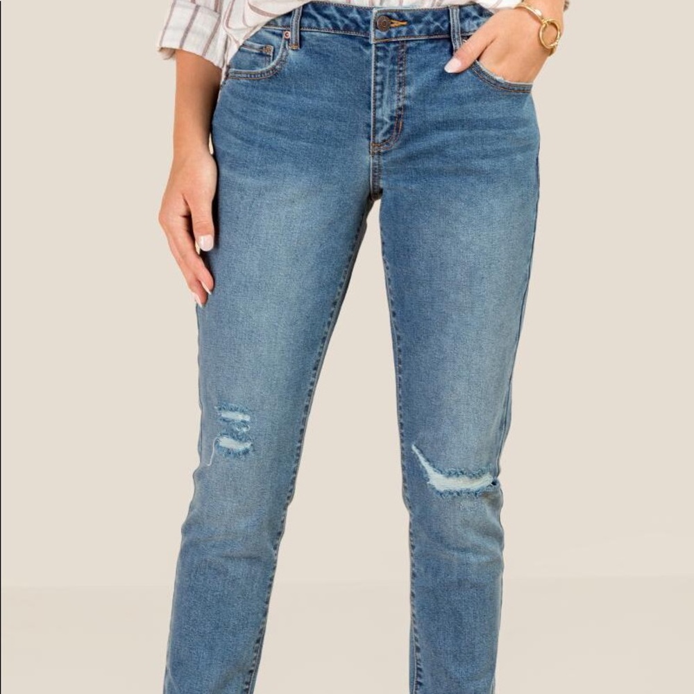 Ripped mid rise girlfriend jeans